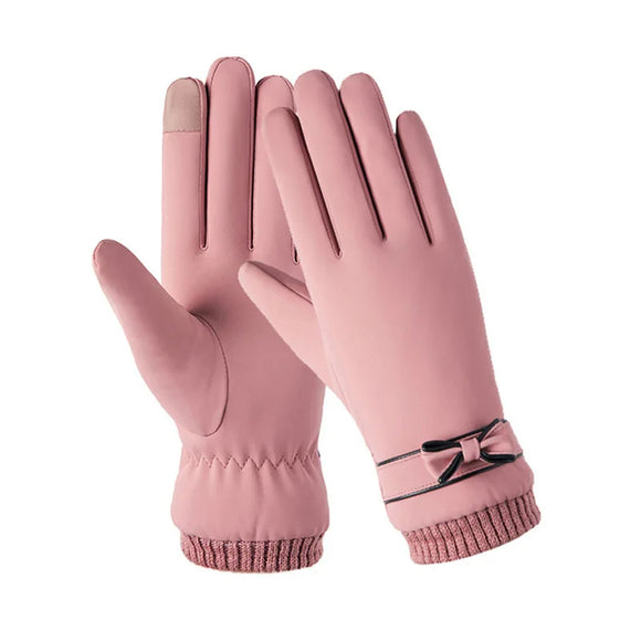 Gants chauffants femme avec nœud papillon sur le poignet sur fond blanc